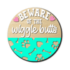 Dog-themed 'Beware of Wiggle Butts' DIY door hanger kit in birch plywood, perfect for painting and personalization.